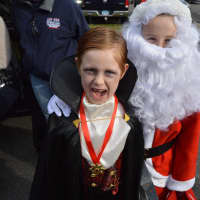 <p>Santa mixes up his holidays at the Trunk or Treat event at the Redding Community Center.</p>