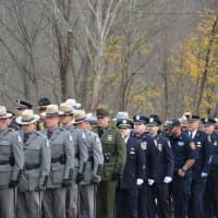 <p>New York State Troopers and police line up for a procession held in connection with the funeral of Putnam County Undersheriff Peter Convery.</p>