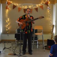 <p>Les Julian, a singer, song creator, and guitarist performs Halloween music for the kids and families.</p>