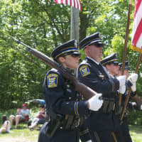 <p>Members of the Monroe Police Department march in Sunday&#x27;s parade.</p>