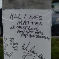 <p>Mourners started a memorial near the corner of Fairfield and Park avenues in Bridgeport, the site of a police officer-involved fatal shooting.</p>