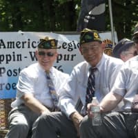 <p>Veterans ride on a float at Sunday&#x27;s Monroe Memorial Day Parade.</p>