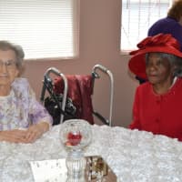 <p>Christine Correnti, left, and Ivy Willoughby are honored in Bridgeport.</p>