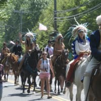 <p>Horses join the parade in Monroe on Sunday for Memorial Day.</p>