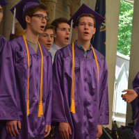 <p>A group of new John Jay High School graduates perform the national anthem at the 2016 commencement. The performance is by The Rolling Tones, an all-boys student a cappella group.</p>