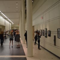 <p>Concertgoers make their way into the new auditorium at Greenwich High School Wednesday.</p>