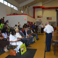 <p>A crowd gathered for the Forum on Gun Violence at Trumbull Gardens Apartments Tuesday.</p>