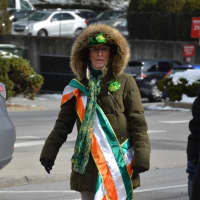 <p>A woman in a parka marches in Mount Kisco&#x27;s St. Patrick&#x27;s Day parade, which was held with temperatures in the 20&#x27;s.</p>