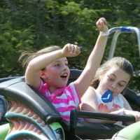 <p>Kids enjoy the rides as Weston hosts its Memorial Day Fair Sunday.</p>
