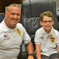 <p>Joey with Emerson Police Chief Michael Mazzeo</p>