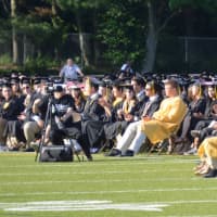 <p>It&#x27;s a sea of black and yellow as the Class of 2016 assembles at Trumbull High for graduation Wednesday.</p>