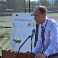 <p>Katonah-Lewisboro Superintendent Andrew Selesnick speaks at the dedication of the John Jay tennis courts.</p>