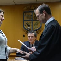 <p>North Castle Town Justice Elyse Lazansky is sworn in for another term in office. Fellow Town Justice Douglas Martino is pictured administering the oath.</p>