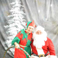 <p>Santa and his helper were present for picture taking.</p>