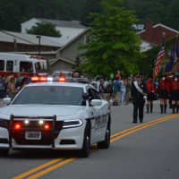 <p>A Carmel police car leads the Mahopac Volunteer Fire Department&#x27;s 2016 dress parade.</p>
