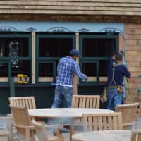 <p>Workers put the finishing touches on the Sue H. Baker Pavilion at Tod&#x27;s Point in Greenwich on Tuesday.</p>