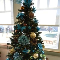 <p>This beautiful blue-themed tree held many details of favorites that the group put together.</p>