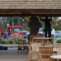 <p>Workers put the finishing touches on the Sue H. Baker Pavilion at Tod&#x27;s Point Tuesday.</p>