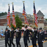 <p>Mahopac firefighters march in their annual dress parade.</p>