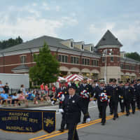 <p>Mahopac firefighters march in their annual dress parade.</p>