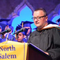<p>North Salem school board President Andrew Brown speaks at the 2016 high school commencement.</p>