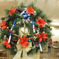 <p>Many wreaths are on display throughout the hallways.</p>