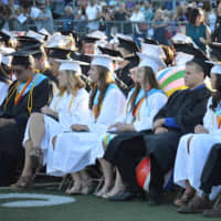 <p>Nearly 400 students graduated from Shelton High School on Friday.</p>