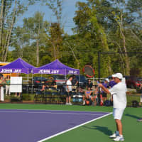 <p>Action on the John Jay tennis courts fellowing a dedication ceremony.</p>