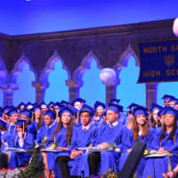 <p>Members of North Salem High School&#x27;s Class of 2016 celebrate their graduation with bouncing beach balls, with coincided with the closure of the commencement.</p>