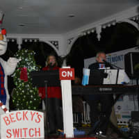 <p>At the culmination of &quot;Frosty Day,&quot; Frosty the Snowman helps with the tree lighting at Wampus Brook Park in Armonk.</p>