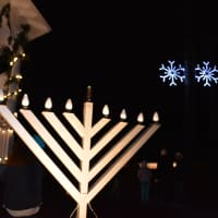 <p>A menorah and snowflakes are among the holiday lighting decorations at Armonk&#x27;s Wampus Brook Park.</p>