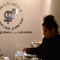 <p>A scene from the grand opening of the Fertility Institute of New Jersey and New York, whose motto is &quot;Turning big dreams into little realities.&quot;</p>