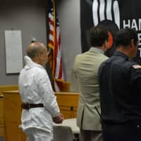 <p>Hengjun Chao, left, is pictured at his arraignment in New Castle Justice Court.</p>