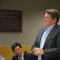 <p>Felix Charney, president of Summit Development, thanks the New Castle Planning Board for granting its approvals for the Chappaqua Crossing retail project.</p>