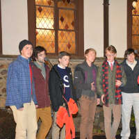 <p>Members of the Rolling Tones, which is John Jay High School&#x27;s all-boy a cappella group, perform at the Katonah tree and menorah lighting event.</p>