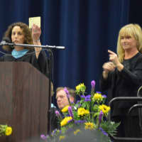 <p>Faculty speaker Judy Silver offers up a late pass “for those who need one,&quot; reminding the students of all they are leaving behind.</p>