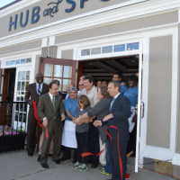 <p>Bridgeport dignitaries cut the ribbon on Hub and Spoke.</p>