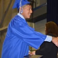 <p>Another happy graduate at Abbott Tech High School&#x27;s commencement.</p>