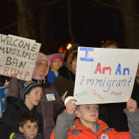 <p>Demonstrators at an interfaith vigil in Chappaqua protest President Donald Trump&#x27;s ban on admitting refugees.</p>