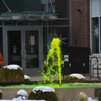 <p>Water in a fountain is dyed green for Mount Kisco&#x27;s St. Patrick&#x27;s Day parade.</p>