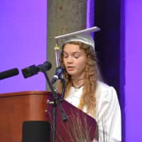 <p>Georgia Grzywacz, John Jay High School&#x27;s 2016 valedictorian, delivers her address.</p>