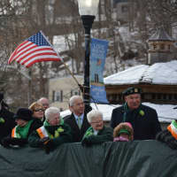 <p>Officials at the reviewing stand during Mount Kisco&#x27;s St. Patrick&#x27;s Day parade.</p>
