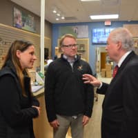 <p>Fairfield First Selectman Michael Tetreau, right, chats with Sue Shunta and Chris Petherick in their new Wild Birds Unlimited Nature Shop.</p>