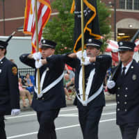 <p>Brewster firefighters march in the Mahopac Volunteer Fire Department&#x27;s dress parade.</p>