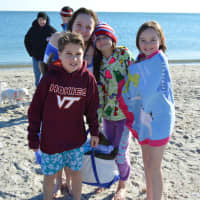 <p>All ages take the Polar Plunge for charity in Westport.</p>