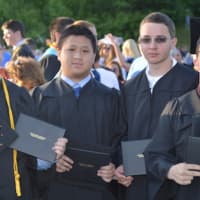 <p>A group of happy graduates at the Shelton High commencement.</p>