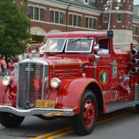 <p>An antique Croton Falls firetruck is driven in the Mahopac Volunteer Fire Department&#x27;s dress parade.</p>