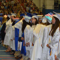 <p>The members of the Class of 2016 line up at the Newtown High graduation.</p>