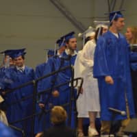 <p>Every graduate gets a flower at the Newtown High School commencement.</p>