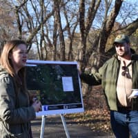 <p>DEP Deputy Commissioner David Glass and Heather Merring, a Park Service staff member who helped develop Trail Tracker, discuss the tool.</p>